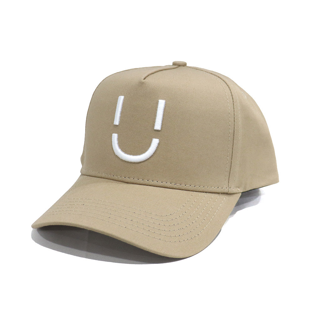 Casquette Ü CAP beige profil visière courbée 