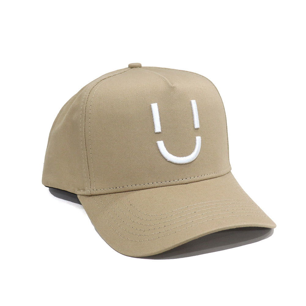 Casquette Ü CAP beige trois quarts 